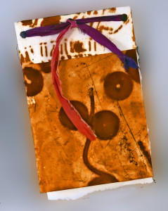 Book cover made with experimental rust-dyed paper - Lyn Belisle